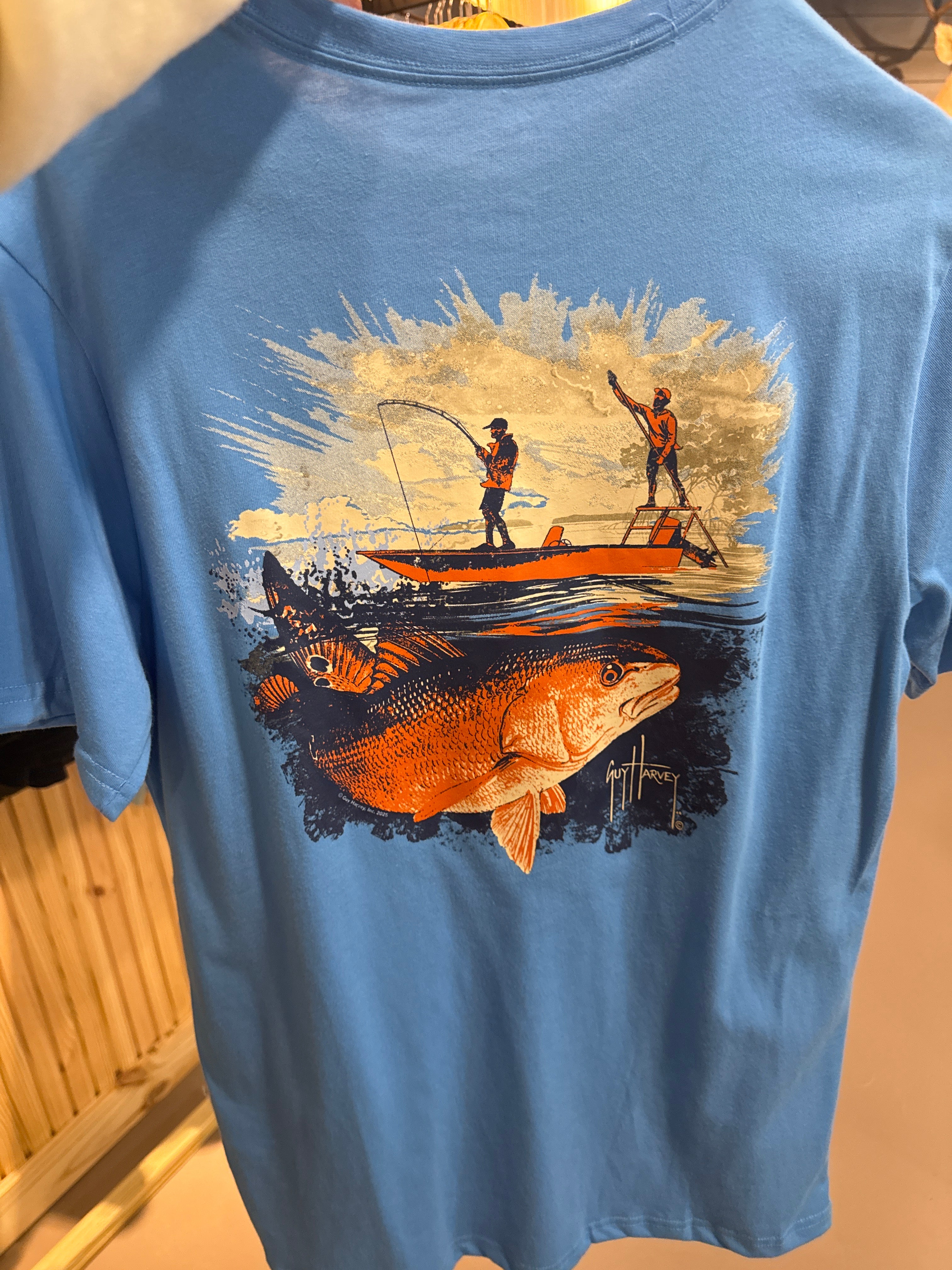 Guy Harvey bass men on boat